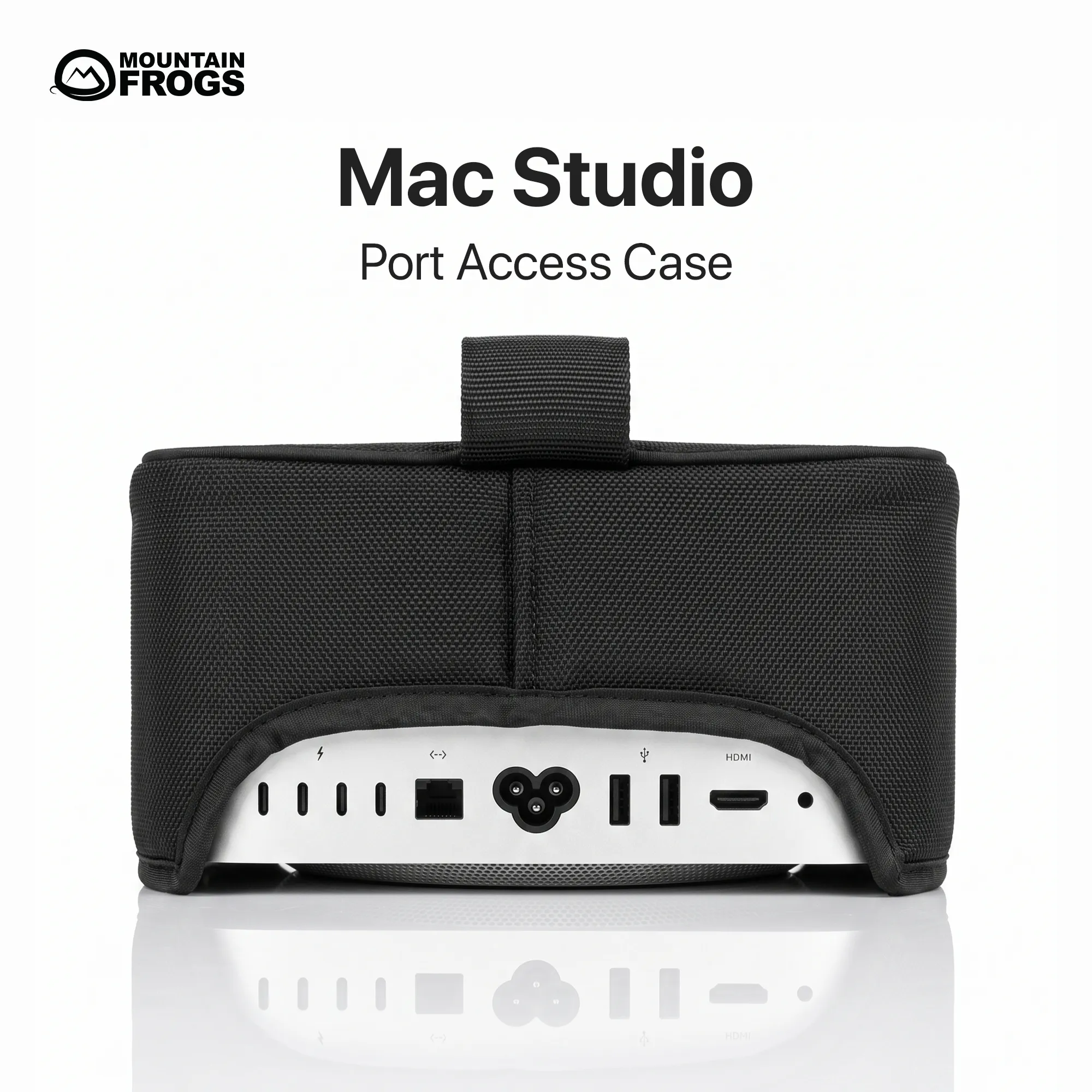 Mountain Frogs stealth black dust cover on Apple Mac Studio showing the custom rear cutout with connected cables on a clean white background.